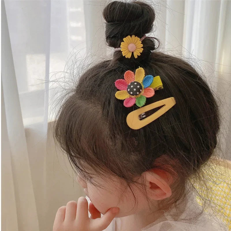 סט 14 סיכות ראש PMGZGLY לילדות – דוגמאות חמודות של פרחים, פירות וקשת בענן طقم 14 مشبك شعر PMGZGLY للبنات – بأشكال لطيفة من الزهور، الفواكه وقوس قزح
