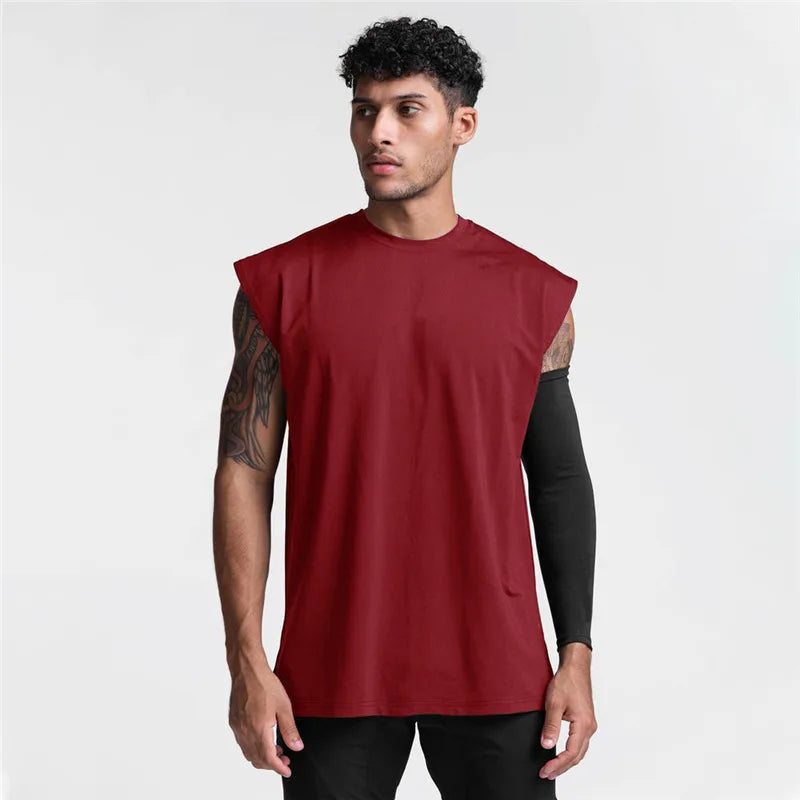 גופיית ספורט קיצית לגברים YOUONGWEAR עם כתפיים רחבות וללא שרוולים – מתאימה לאימונים ולחדר כושר قميص رياضي بدون أكمام (كتف عريض) للرجال من YOUONGWEAR – مناسب للتمارين والجيم لموسم الصيف
